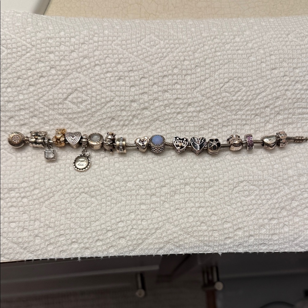 Pandora Silver Charm Bracelet with Blue and Gold Accents